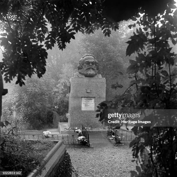 Tomb of Karl Marx, Highgate Cemetery, Hampstead, London, 1954. A view towards the tomb of the German political philospher who died in London in 1883....