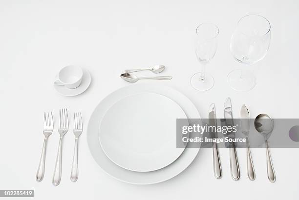 formal place setting - large group of objects white stock pictures, royalty-free photos & images