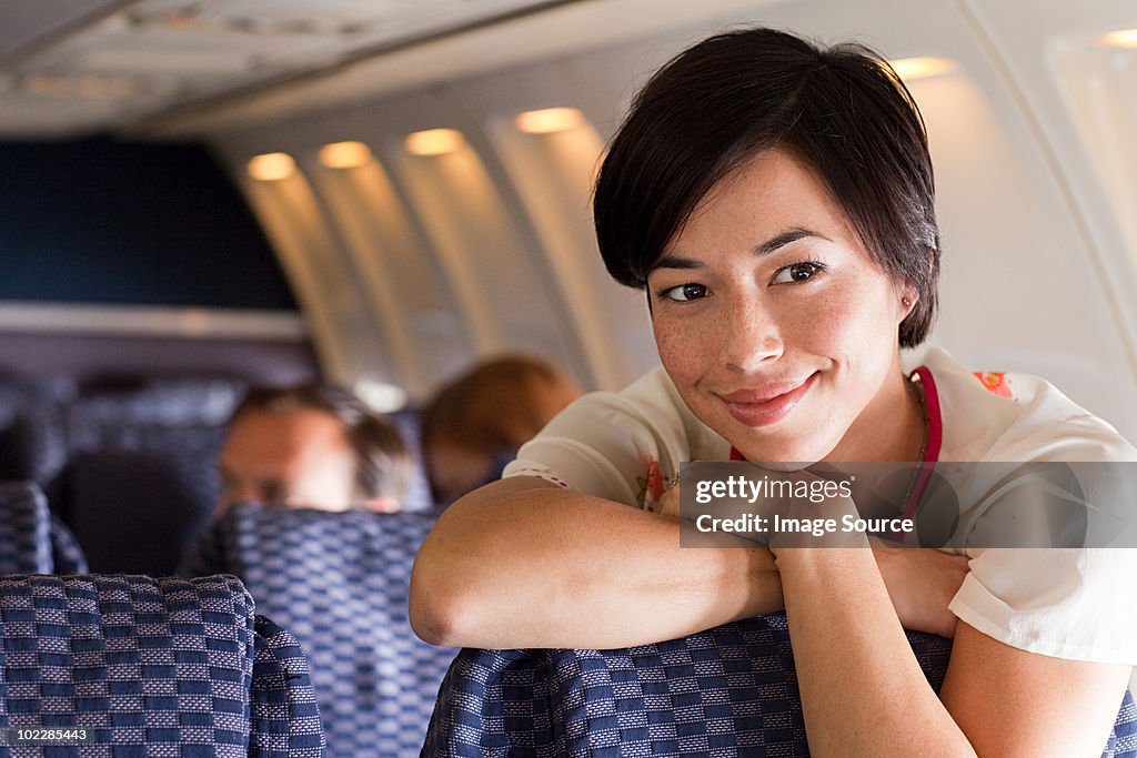 Young woman on an airplane