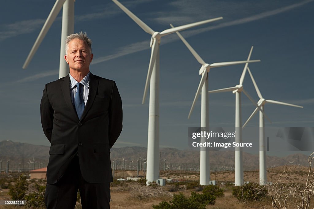 Businessman and wind turbines