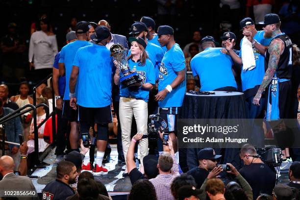 Head coach Nancy Lieberman of Power celebrates with the Championship trophy after defeating 3's Company during the BIG3 Championship at the Barclays...