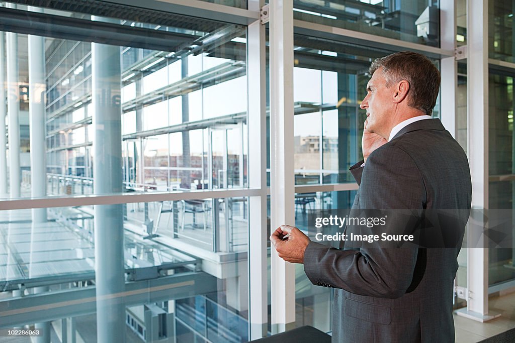 Businessman on cellphone in office