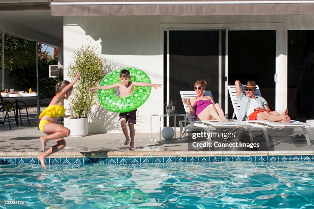 Family and outdoor swimming pool