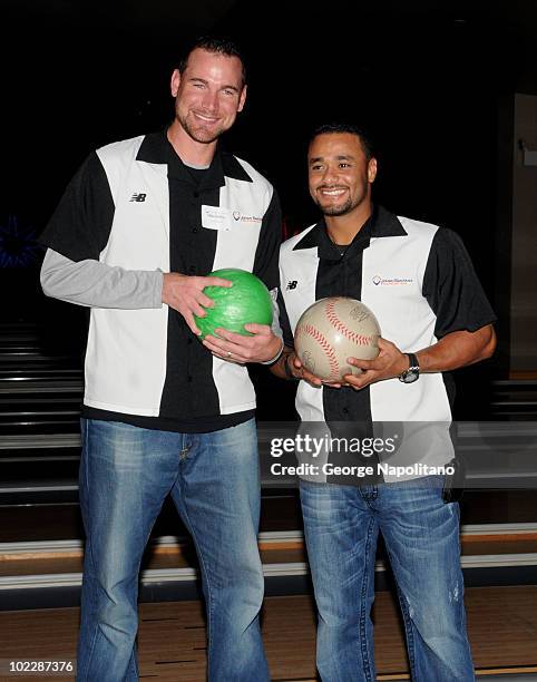 New York Mets pitchers Mike Pelfrey and Johan Santana attend the Johan Santana All-Star Bowling Classic to benefit skin cancwe resarch at Lucky...