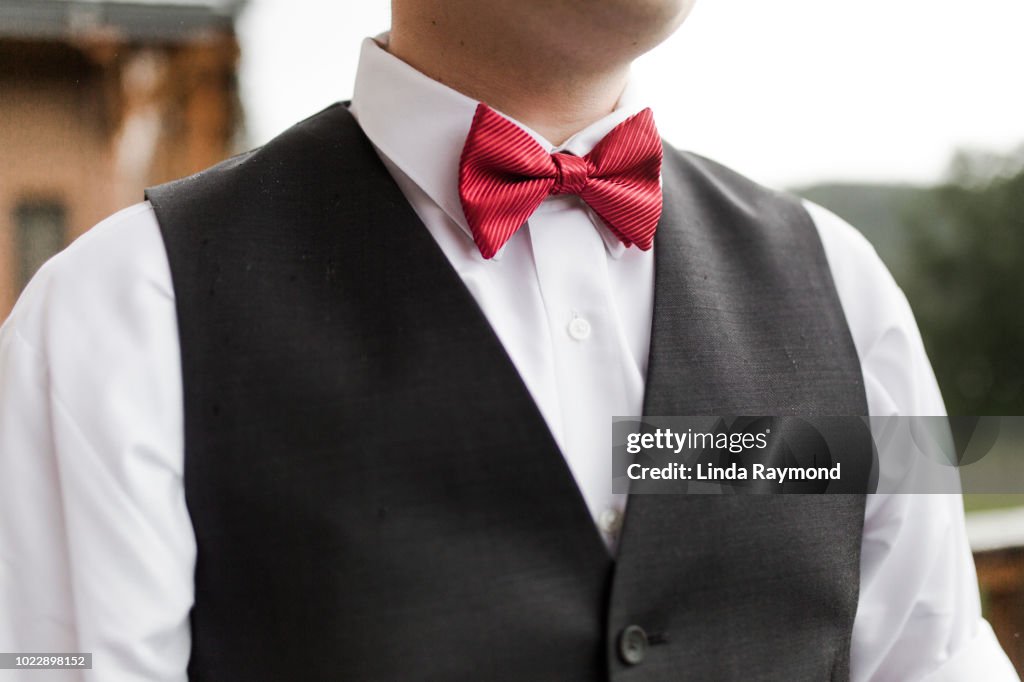 Grooms red bow tie