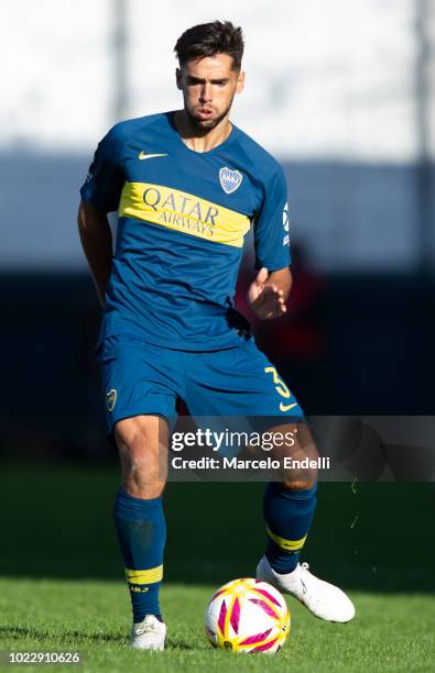 Emmanuel Mas of Boca Juniors kicks the ball during a match between Estudiantes and Boca Juniors as part of Superliga Argentina 2018/19 at Estadio...