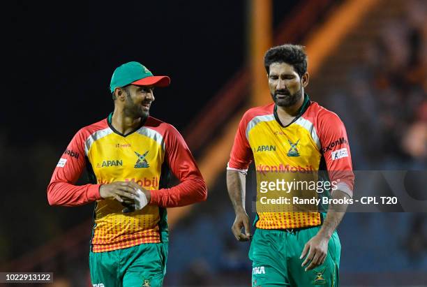 In this handout image provided by CPL T20, Shoaib Malik and Sohail Tanvir of Guyana Amazon Warriors during match 15 of the Hero Caribbean Premier...