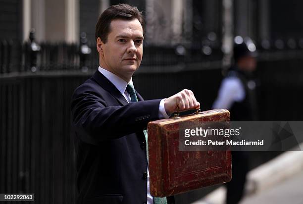 Chancellor of the Exchequer George Osborne holds Gladstone's original budget box as he leaves 11 Downing Street for Parliament on June 22, 2010 in...