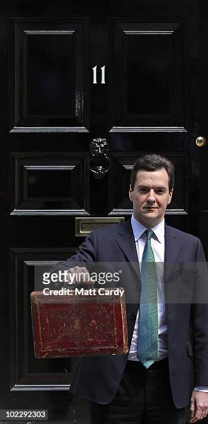 Chancellor of the Exchequer George Osborne holds Gladstone's original budget box as he leaves 11 Downing Street for Parliament on June 22, 2010 in...