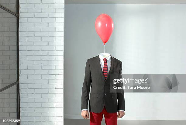 man with balloon as a head - headless man 個照片及圖片檔