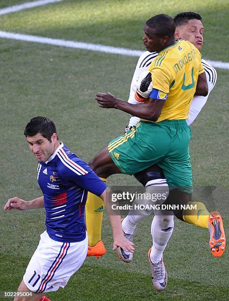 South Africa's defender Aaron Mokoena clashes with South Africa's goalkeeper Moeneeb Josephs during the Group A first round 2010 World Cup football...