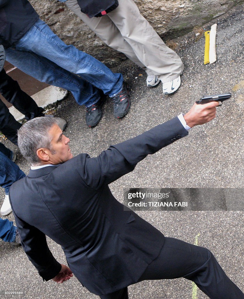US actor George Clooney acts during the