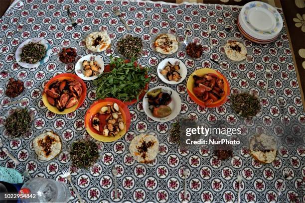 Traditional Turkish food sits on a table on the last day of Eid al-Adha in southern Hatay province of Turkey on August 24, 2018. Hatay is bordered by...