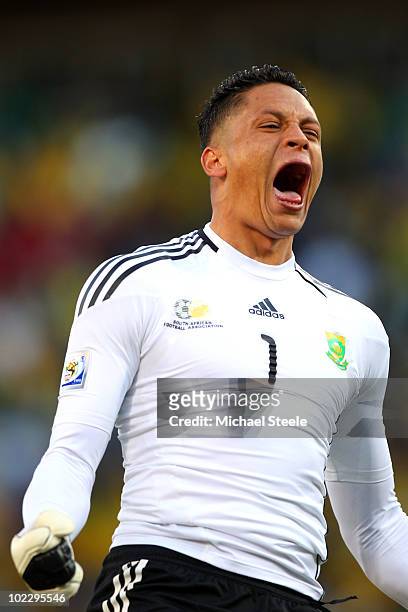 Moneeb Josephs of South Africa celebrates his team's second goal by Katlego Mphela during the 2010 FIFA World Cup South Africa Group A match between...