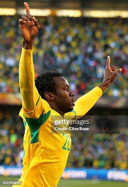 Bongani Khumalo of South Africa celebrates scoring the opening goal during the 2010 FIFA World Cup South Africa Group A match between France and...