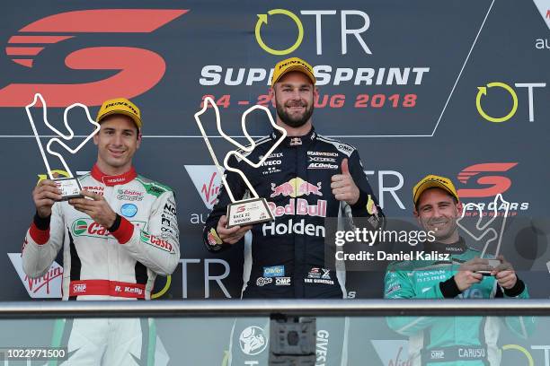 2nd place Rick Kelly driver of the Nissan Motorsport Nissan Altima, 1st place Shane Van Gisbergen driver of the Red Bull Holden Racing Team Holden...