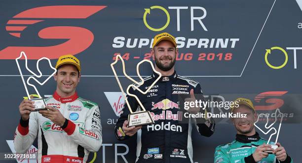 2nd place Rick Kelly driver of the Nissan Motorsport Nissan Altima, 1st place Shane Van Gisbergen driver of the Red Bull Holden Racing Team Holden...