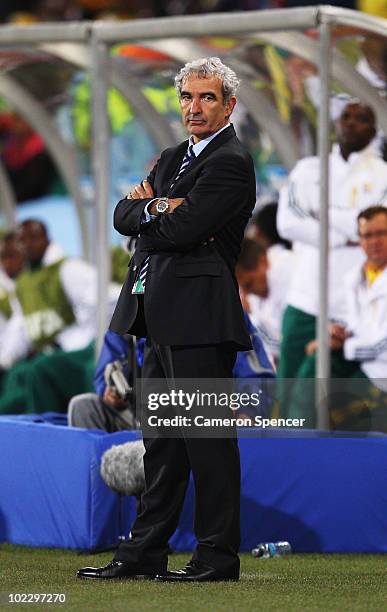Raymond Domenech head coach of France looks thoughtful during the 2010 FIFA World Cup South Africa Group A match between France and South Africa at...