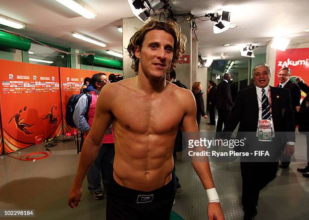Diego Forlan of Uruguay walks to his dressing room after the 2010 FIFA World Cup South Africa Group A match between Mexico and Uruguay at the Royal...