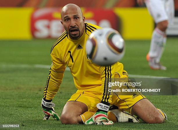 Mexico's goalkeeper Oscar Perez eyes the ball during their Group A first round 2010 World Cup football match on June 22, 2010 at Royal Bafokeng...