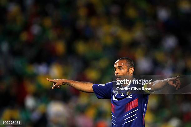 Thierry Henry of France gestures to team mates during the 2010 FIFA World Cup South Africa Group A match between France and South Africa at the Free...