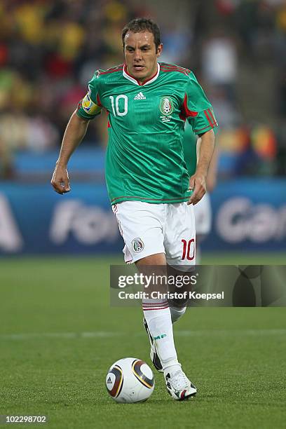 Cuauhtemoc Blanco of Mexico runs with the ball during the 2010 FIFA World Cup South Africa Group A match between Mexico and Uruguay at the Royal...