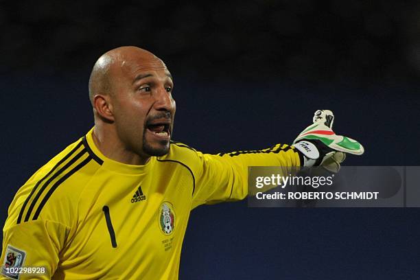 Mexico's goalkeeper Oscar Perez gestures during their Group A first round 2010 World Cup football match on June 22, 2010 at Royal Bafokeng stadium in...
