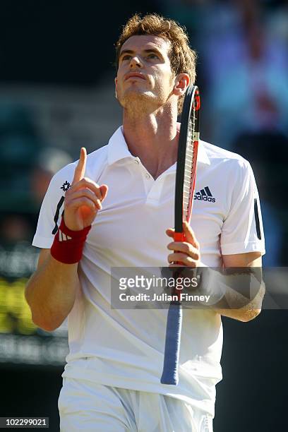 Andy Murray of Great Britain reacts after winning his first round match against Jan Hajek of Czech Republic on Day Two of the Wimbledon Lawn Tennis...
