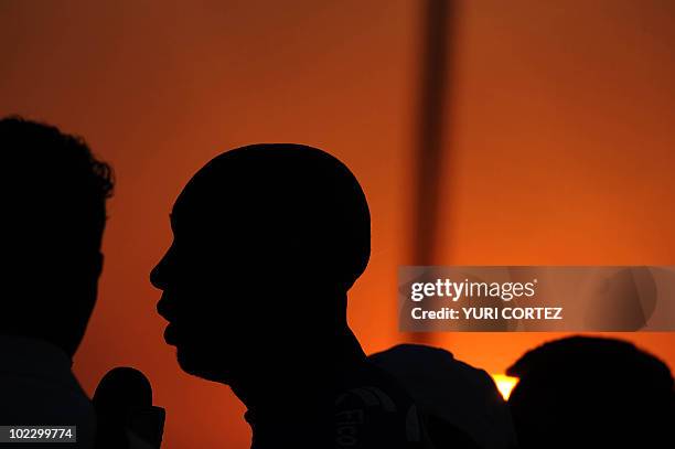 Honduras player Jerry Palacios is silhouetted as he speaks during a press conference before a training session at the Randburg stadium on June 22,...