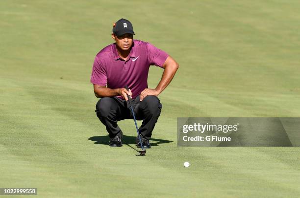 Tiger Woods lines up a putt on the tenth hole during the second round of the Quicken Loans National at TPC Potomac on June 29, 2018 in Potomac,...