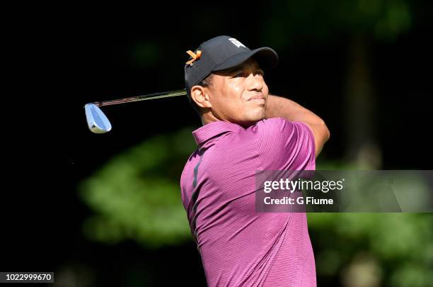 Tiger Woods hits a tee shot on the 12th hole during the second round of the Quicken Loans National at TPC Potomac on June 29, 2018 in Potomac,...