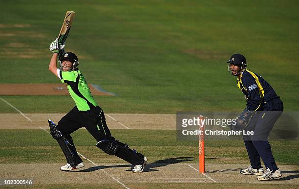 Steven Davies of Surrey in action as Nic Pothas of Hampshire watches during the Friends Provident Twenty20 match between Surrey and Hampshire at The...