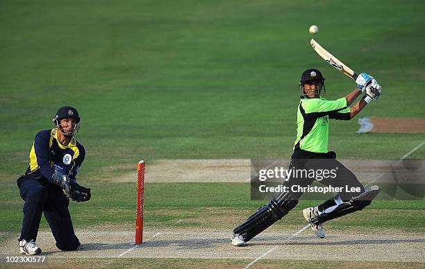 Younis Khan of Surrey in action as Nic Pothas of Hampshire watches during the Friends Provident Twenty20 match between Surrey and Hampshire at The...