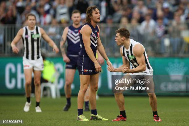 Josh Thomas of the Magpies celebrates a goal during the round 23 AFL match between the Fremantle Dockers and the Collingwood Magpies at Optus Stadium...