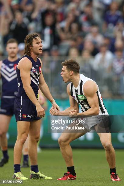 Josh Thomas of the Magpies celebrates a goal during the round 23 AFL match between the Fremantle Dockers and the Collingwood Magpies at Optus Stadium...