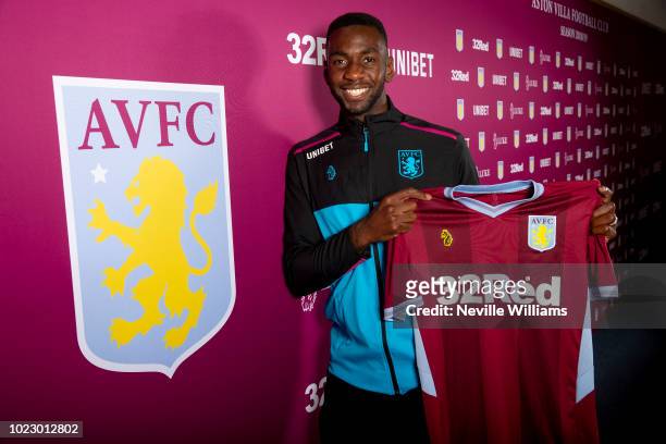New signing Yannick Bolasie of Aston Villa poses for a picture as he is unveiled as a new signing, at the club's training ground at Bodymoor Heath on...