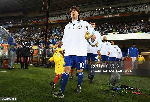 Lionel Messi of Argentina walks onto the field before the 2010 FIFA World Cup South Africa Group B match between Greece and Argentina at Peter Mokaba...