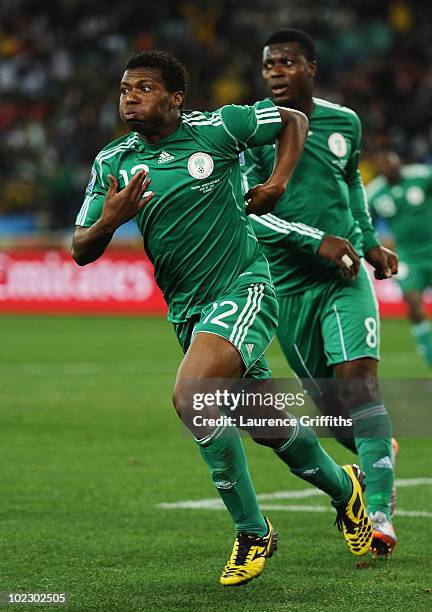 Kalu Uche of Nigeria celebrates with team mate Yakubu Ayegbeni after scoring the opening goal during the 2010 FIFA World Cup South Africa Group B...