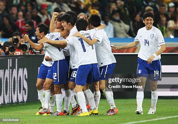 The South Korea team celebrates Park Chu-Young goal from a free kick during the 2010 FIFA World Cup South Africa Group B match between Nigeria and...