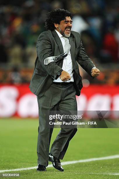 Diego Maradona head coach of Argentina celebrates a goal during the 2010 FIFA World Cup South Africa Group B match between Greece and Argentina at...