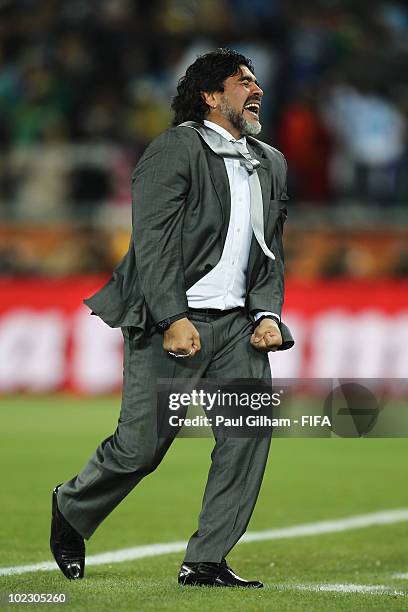 Diego Maradona head coach of Argentina celebrates a goal during the 2010 FIFA World Cup South Africa Group B match between Greece and Argentina at...