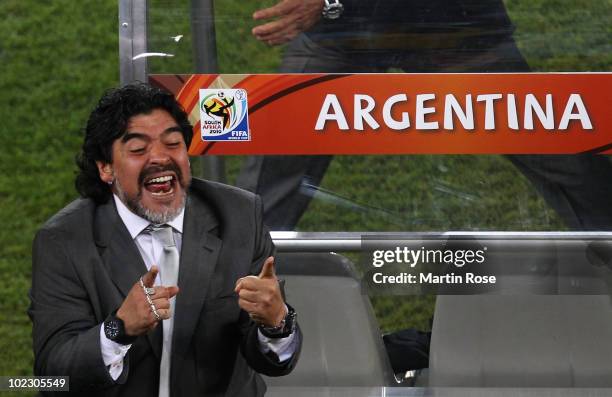 Diego Maradona head coach of Argentina celebrates victory after the 2010 FIFA World Cup South Africa Group B match between Greece and Argentina at...