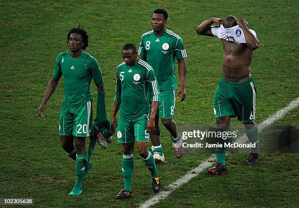 Dickson Etuhu, Rabiu Afolabi, Yakubu Ayegbeni and Danny Shittu of Nigeria are dejected after a draw and elimination in the 2010 FIFA World Cup South...