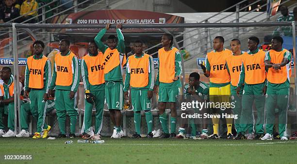 The Nigeria bench are dejected after a draw and elimination in the 2010 FIFA World Cup South Africa Group B match between Nigeria and South Korea at...