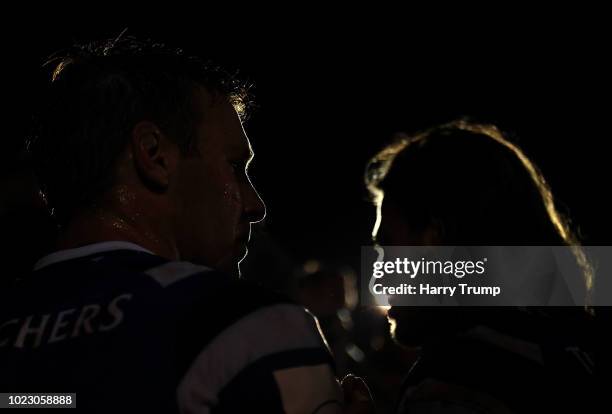 Will Chudley and Max Clark of Bath Rugby make their way off the pitch after the match during the Pre Season Friendly match between Bath and Scarlets...