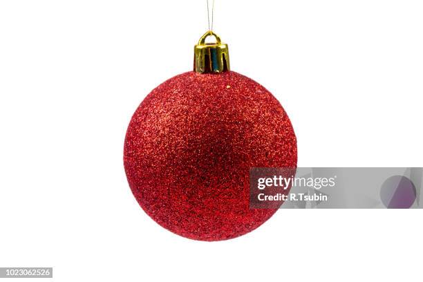 red christmas ball isolated on white background - heritage round one stock-fotos und bilder