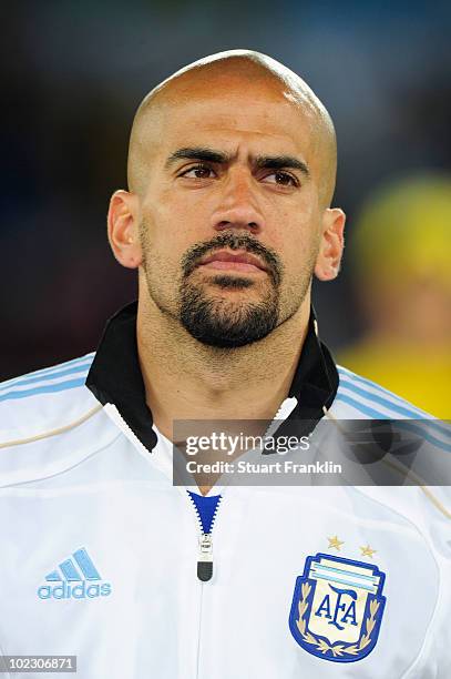 Juan Veron of Argentina lines up for the national anthems prior to the 2010 FIFA World Cup South Africa Group B match between Greece and Argentina at...