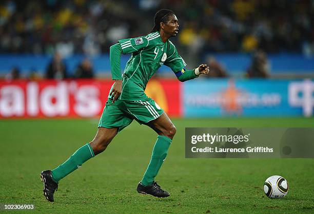 Nwankwo Kanu of Nigeria runs with the ball during the 2010 FIFA World Cup South Africa Group B match between Nigeria and South Korea at Durban...