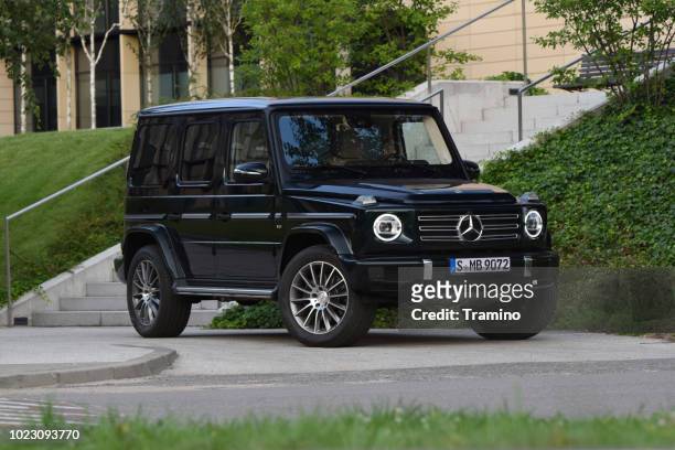 mercedes-benz g 500 on the street - mercedes benz g class stock pictures, royalty-free photos & images