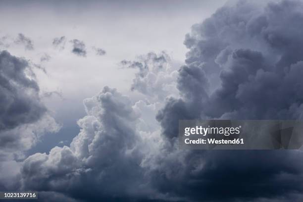 germany, bavaria, rain cloud - wolkengebilde stock-fotos und bilder